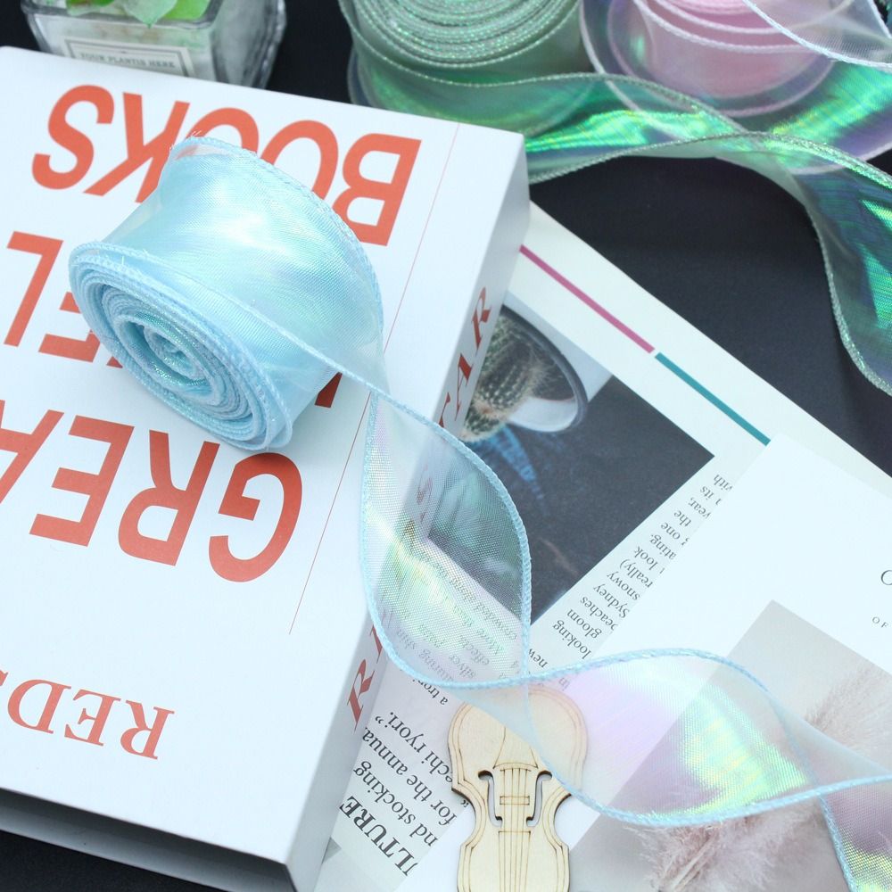 ริบบิ้นผ้าซาตินตาข่ายลายลูกไม้ - Ribbon Organza Roll บทวิจารณ์และราคา